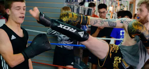 Muay Thai kick at an interclub at The Combat Lab, Weymouth.